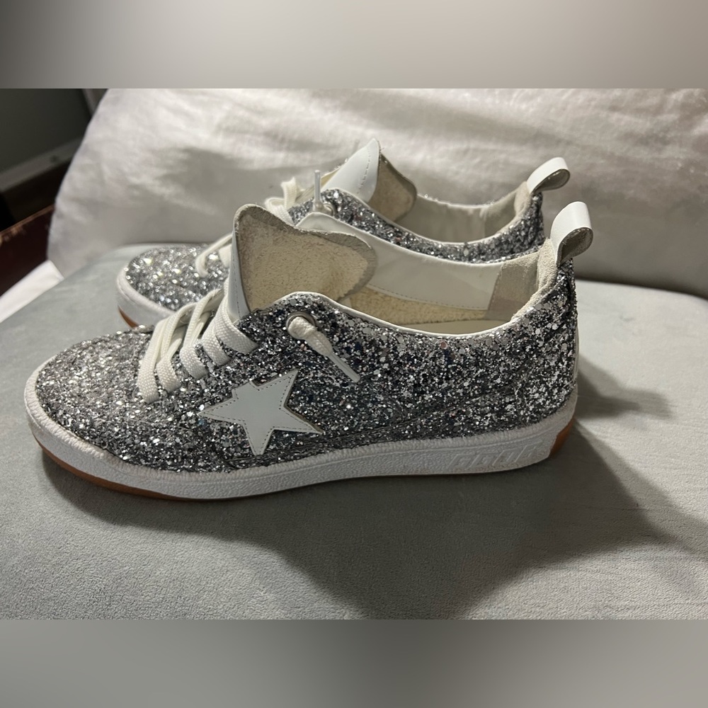 These sneakers have been worn 1 time and in great condition.